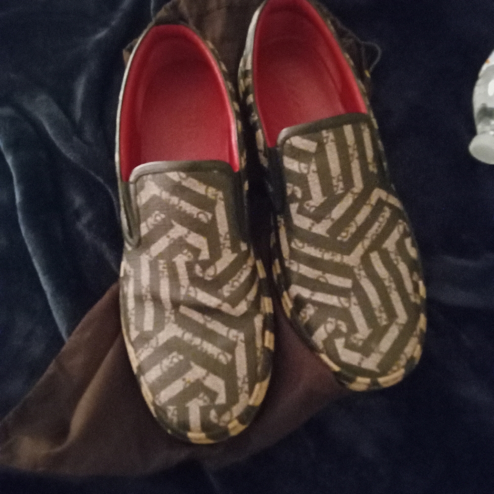 Gucci black and read leather loafers